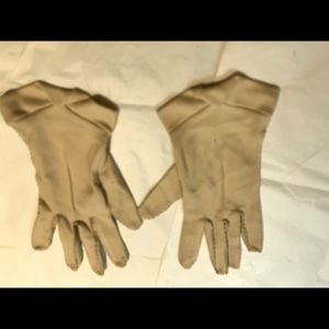 Vintage tan/cream gloves with unique folded hem, 8” long & 3.5” across flat.